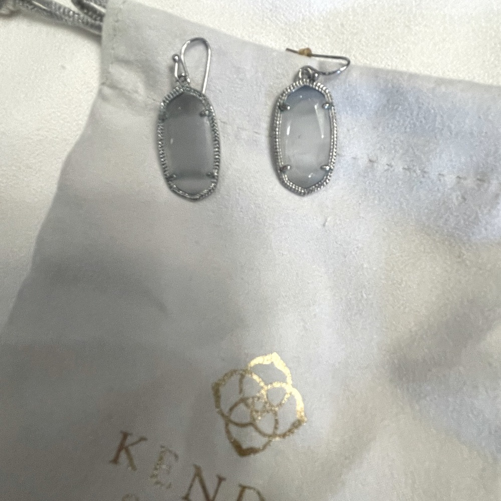 Kendra Scott earrings.